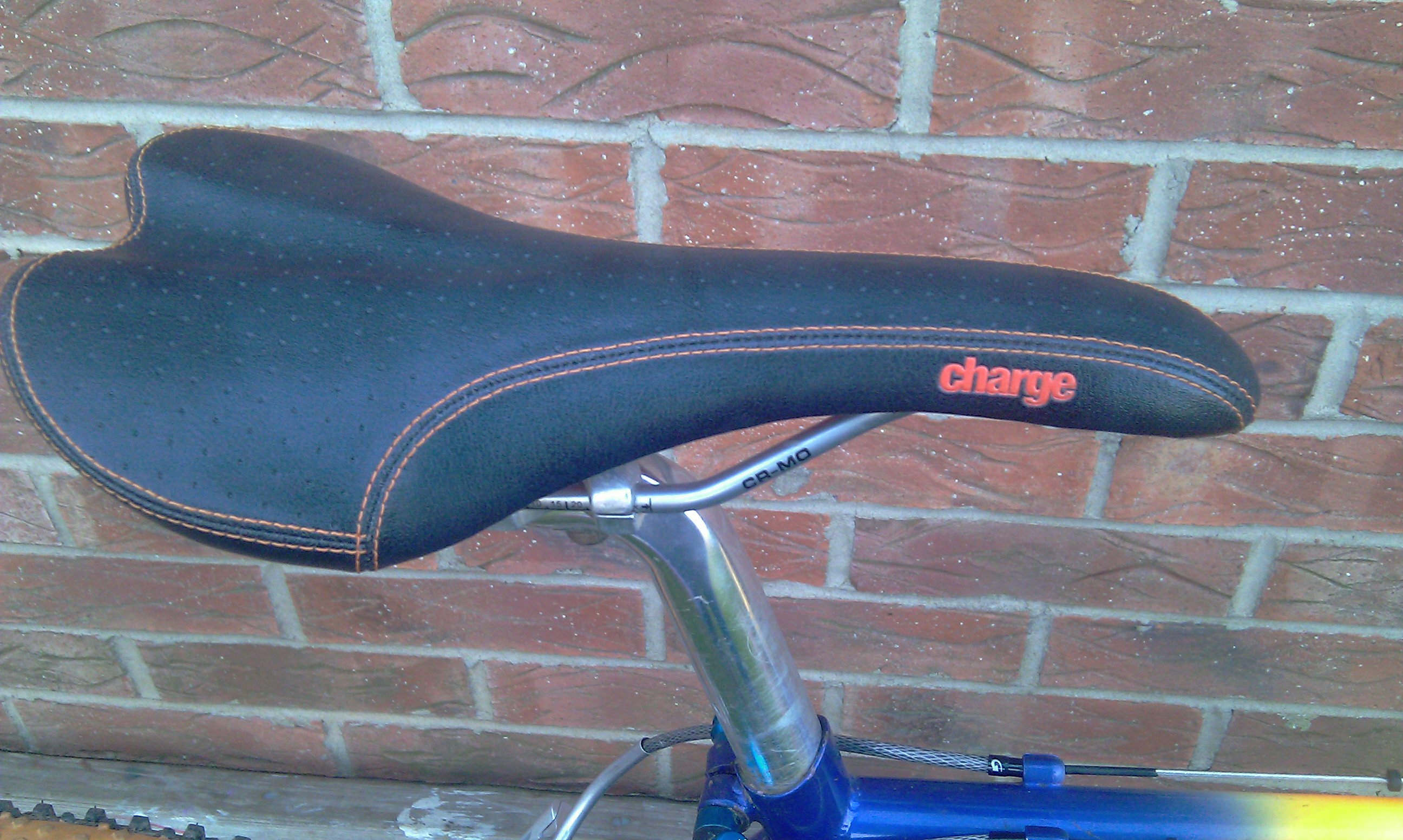 Charge spoon saddle orange 2025